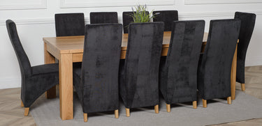 Dakota Extra Large Oak Dining Table with 10 Lola Black Fabric Chairs
