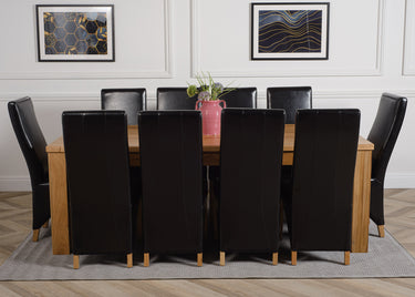 Dakota Extra Large Oak Dining Table with 10 Lola Black Leather Chairs