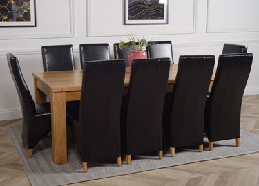Dakota Extra Large Oak Dining Table with 10 Lola Black Leather Chairs