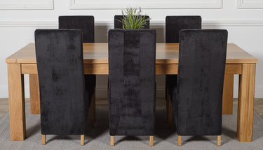 Dakota Extra Large Oak Dining Table with 6 Lola Black Fabric Chairs