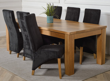 Dakota Extra Large Oak Dining Table with 6 Lola Black Fabric Chairs