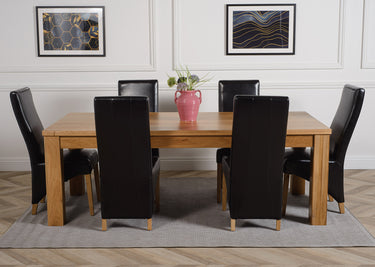 Dakota Extra Large Oak Dining Table with 6 Lola Black Leather Chairs