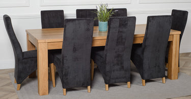 Dakota Extra Large Oak Dining Table with 8 Lola Black Fabric Chairs