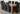 Dakota Extra Large Oak Dining Table with 8 Lola Black Fabric Chairs
