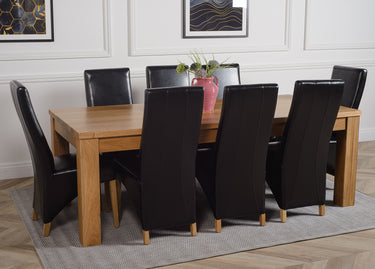 Dakota Extra Large Oak Dining Table with 8 Lola Black Leather Chairs