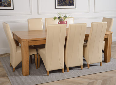 Dakota Extra Large Oak Dining Table with 8 Lola Ivory Leather Chairs