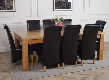 Dakota Extra Large Oak Dining Table with 8 Montana Black Leather Chairs