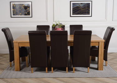 Dakota Extra Large Oak Dining Table with 8 Montana Brown Leather Chairs