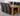Dakota Large Oak Dining Table with 6 Lola Black Fabric Chairs