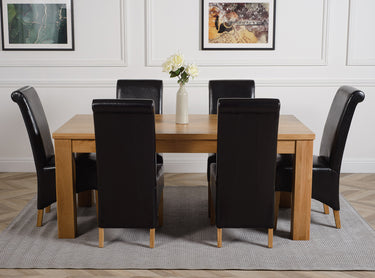 Dakota Large Oak Dining Table with 6 Montana Black Leather Chairs