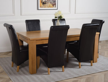 Dakota Large Oak Dining Table with 6 Montana Black Leather Chairs