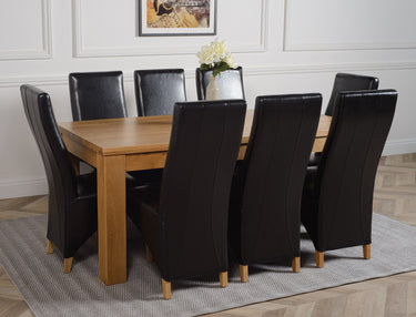 Dakota Large Oak Dining Table with 8 Lola Black Leather Chairs