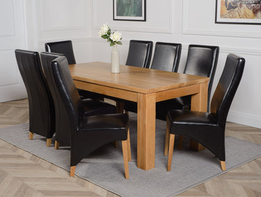 Dakota Large Oak Dining Table with 8 Lola Black Leather Chairs