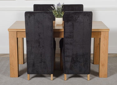 Dakota Medium Oak Dining Table with 4 Lola Black Fabric Chairs