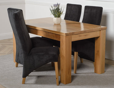 Dakota Medium Oak Dining Table with 4 Lola Black Fabric Chairs