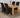 Dakota Medium Oak Dining Table with 4 Montana Black Fabric Chairs