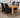 Dakota Medium Oak Dining Table with 4 Montana Black Leather Chairs