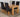 Dakota Medium Oak Dining Table with 4 Washington Black Fabric Chairs