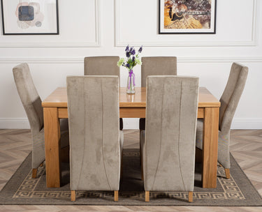 Dakota Medium Oak Dining Table with 6 Lola Grey Fabric Chairs