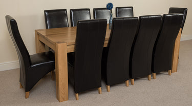Kuba Extra Large Oak Dining Table with 10 Lola Black Leather Chairs
