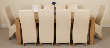 Kuba Extra Large Oak Dining Table with 10 Lola Ivory Leather Chairs