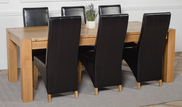 Kuba Extra Large Oak Dining Table with 6 Lola Black Leather Chairs
