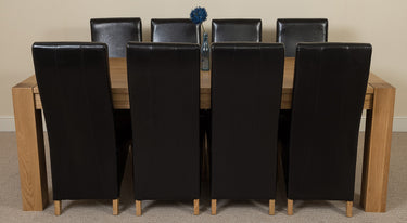 Kuba Extra Large Oak Dining Table with 8 Lola Black Leather Chairs