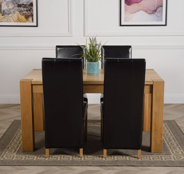 Kuba Medium Oak Dining Table with 4 Lola Black Leather Chairs