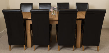 Richmond Medium Oak Extendable Dining Table with 8 Montana Black Leather Chairs