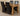 Richmond Medium Oak Extendable Dining Table with 4 Lola Black Leather Chairs