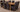 Richmond Medium Oak Extendable Dining Table with 8 Lola Black Fabric Chairs