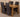 Seattle Oak Extending Dining Table with 4 Lola Black Fabric Chairs