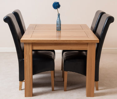 Seattle Oak Extending Dining Table with 4 Montana Black Leather Chairs