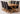 Vermont Cross Leg Oak Extending Dining Table with 6 Washington Black Leather Chairs