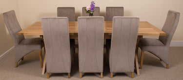 Vermont Cross Leg Oak Extending Dining Table with 8 Lola Grey Fabric Chairs