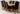 Vermont Cross Leg Oak Extending Dining Table with 8 Washington Black Leather Chairs