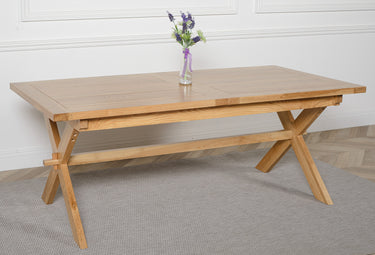 Vermont Cross Leg Oak Extending Dining Table with 8 Lola Grey Fabric Chairs